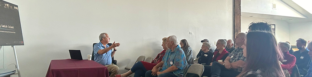 Tribal Chairman, Tom Wooten, presenting a hybrid history talk at Fidalgo Bay Resort. 